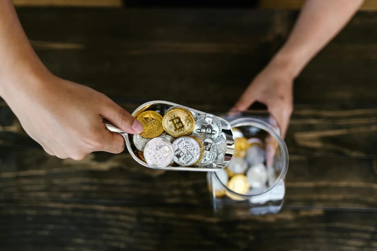 A cluster of cryptocurrencies including Bitcoin, Ethereum on a subtle background symbolizing digital finance.