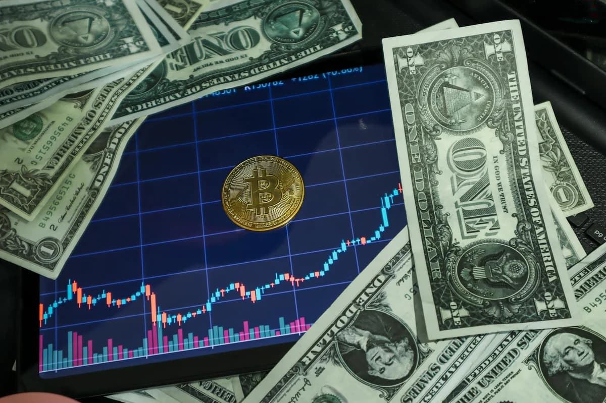 Golden Bitcoin on a rising digital financial market chart, symbolizing cryptocurrency trends.