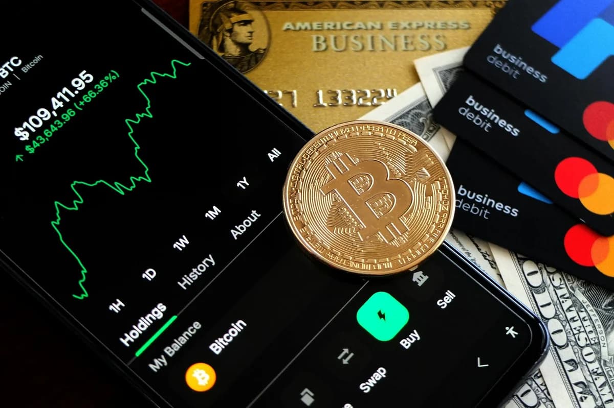 Close-up of a computer screen showing dynamic financial market data and charts, indicating real-time trading updates.