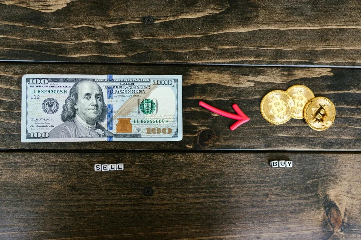 Golden Bitcoin coins in front of a keyboard, symbolizing digital currency and finance