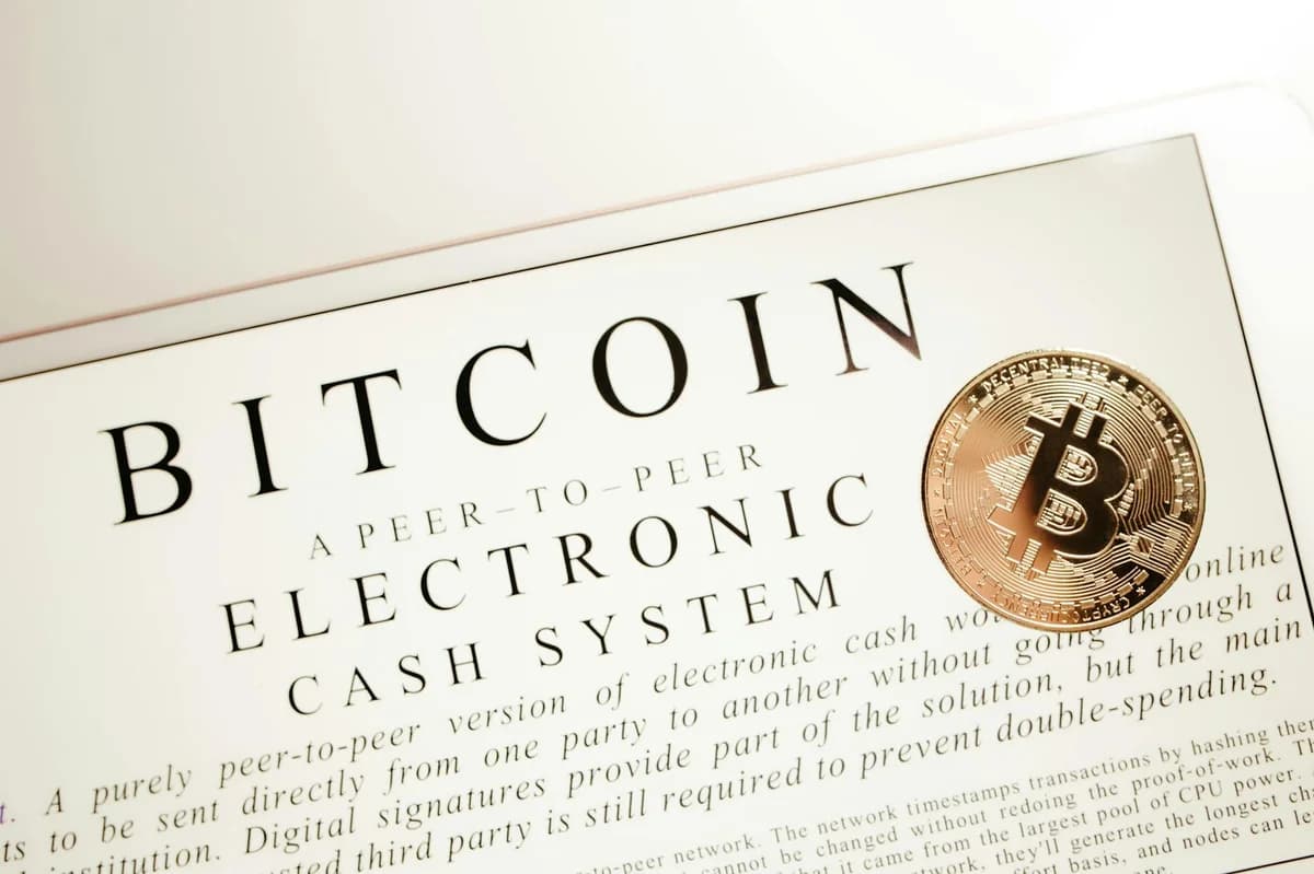 Glowing neon Bitcoin symbol on a rustic background representing digital currency and innovation.