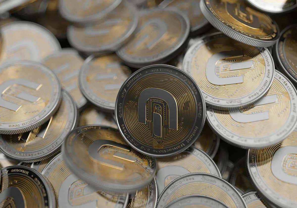 Close-up of North Macedonian denar coins on a bamboo table with artistic lighting.