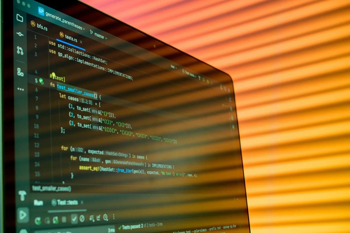 Close-up of HTML and JavaScript code on a computer screen in Visual Studio Code.