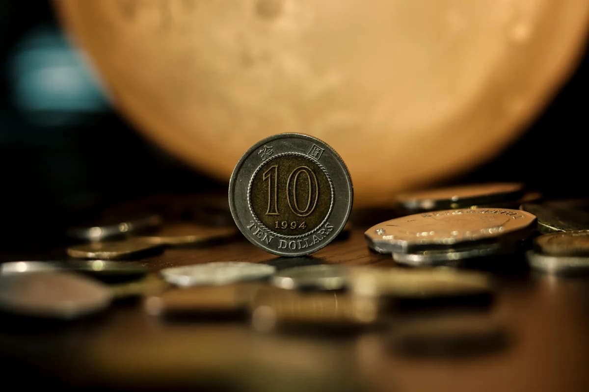 Conceptual image of the word 'Annuities' spelled with tiles on a vibrant red background.