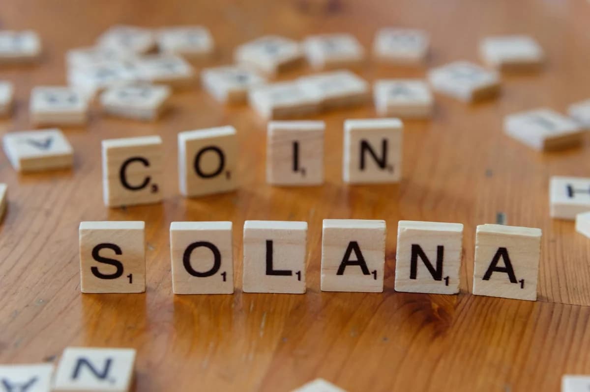 Wooden letter tiles forming the word 'inflation' on a rustic wooden surface, symbolizing economic themes.