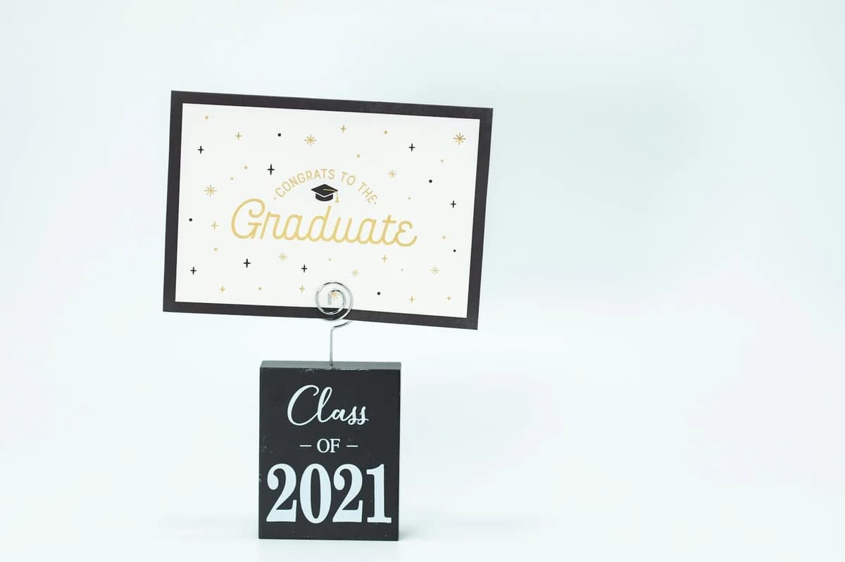 Elegant graduation card display for the Class of 2021 with greeting message.