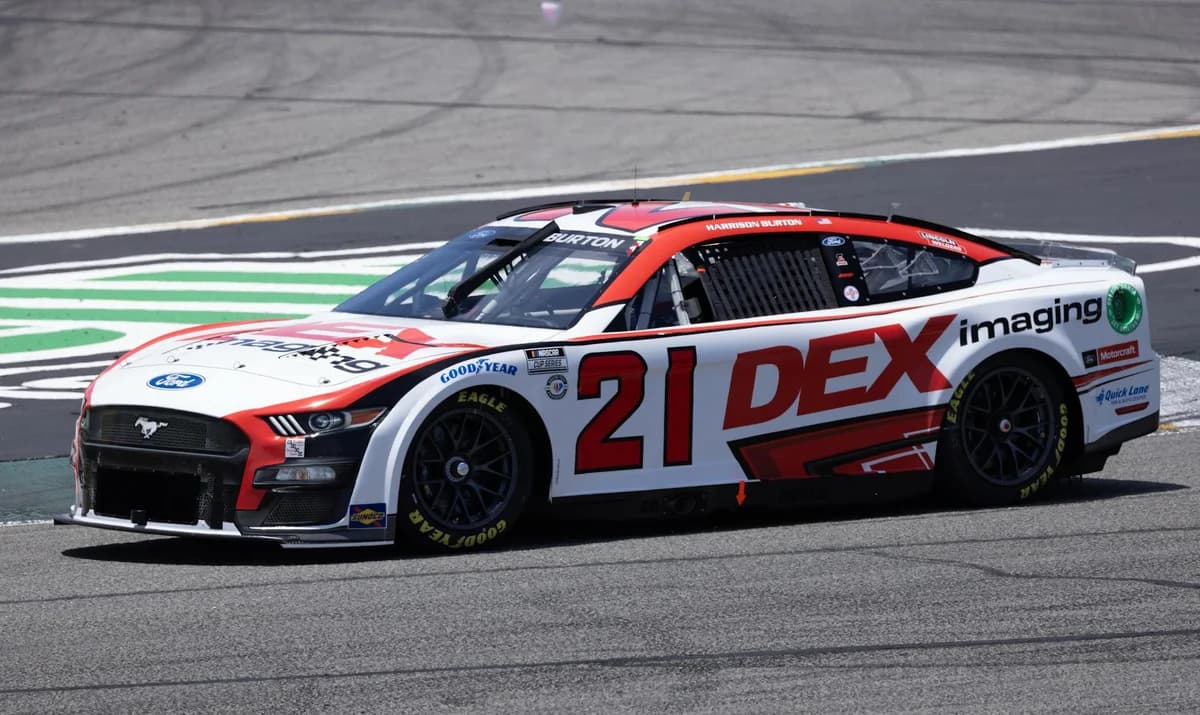 Racing car speeding on a circuit track during a tournament.