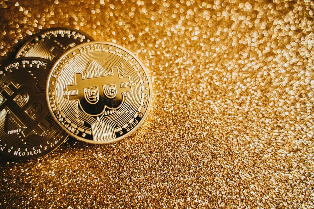 A close-up of a golden Bitcoin highlighting its digital currency design.