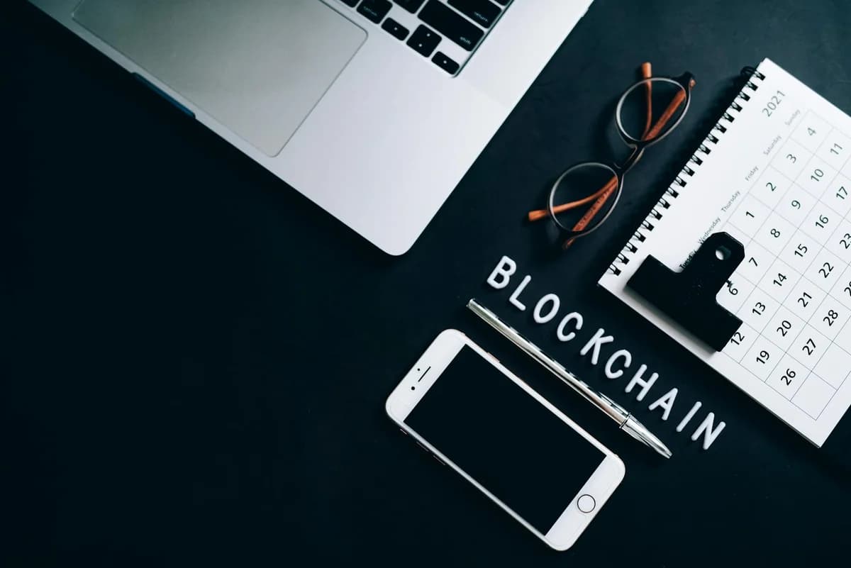 Minimalist image of Bitcoin, Ethereum, and Litecoin coins on a baby blue background.