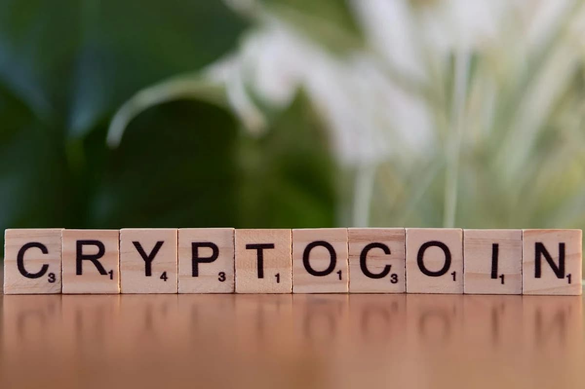 Golden Bitcoin coins in front of a keyboard, symbolizing digital currency and finance