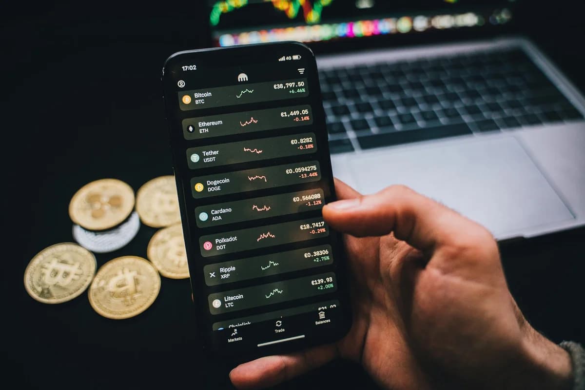 High-quality image of a gold IOTA cryptocurrency coin on a plain background, ideal for finance concepts.