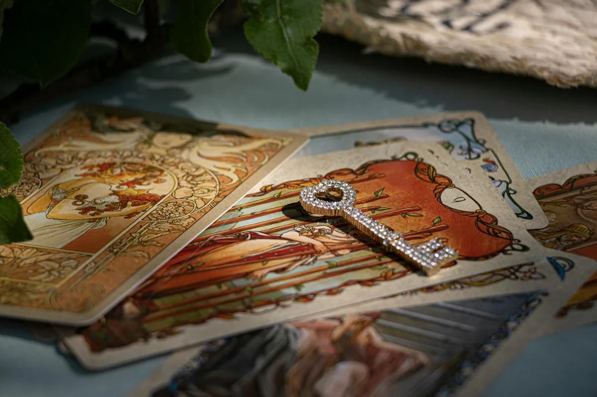 Intriguing tarot card spread on a textured wooden table, exuding mystical energy.
