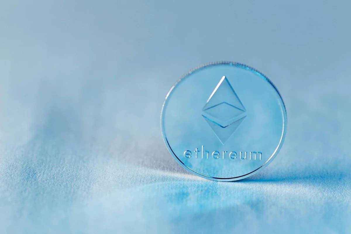 Close-up of an Ethereum coin on a soft, neutral background symbolizing modern cryptocurrency.