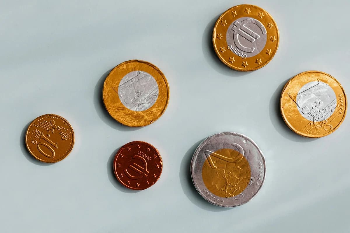 Top view of coins diverse denomination of European Union placed on marble surface