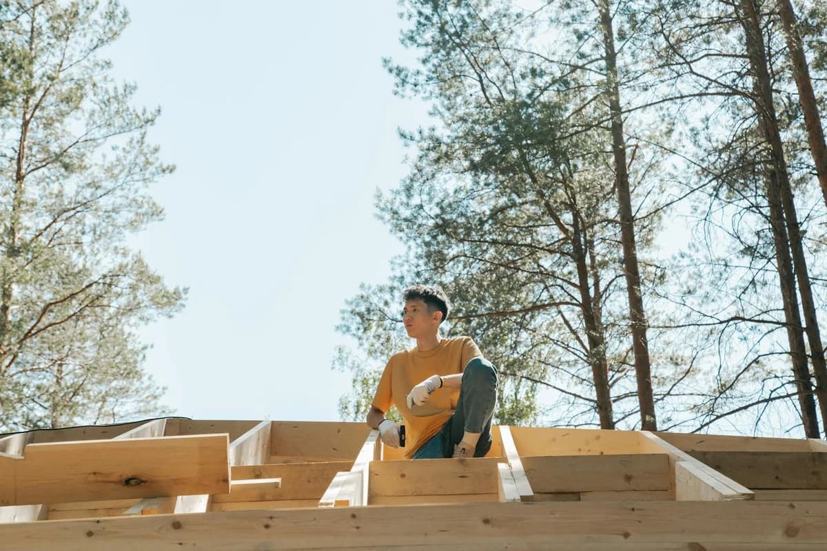 A young adult working on construction outdoors. Captured with Canon EOS 6D.