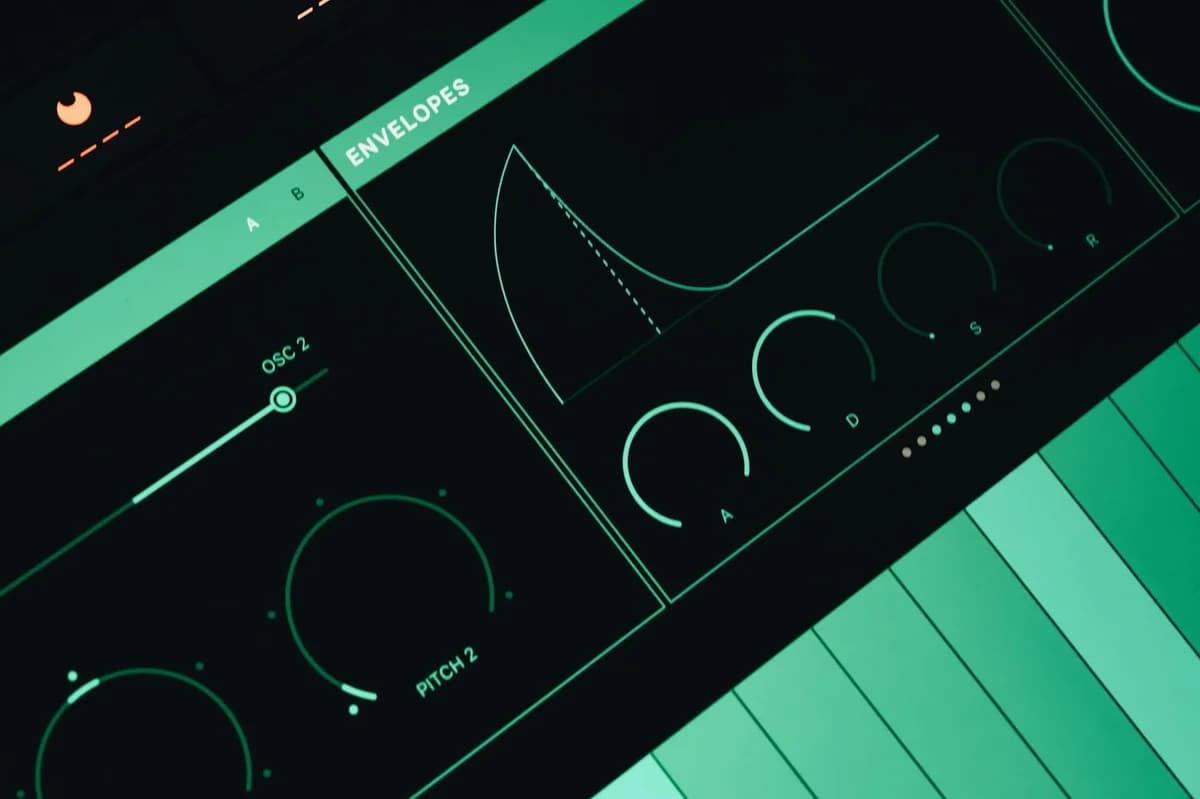 Close-up view of a synthesizer interface showing envelopes and oscillators.
