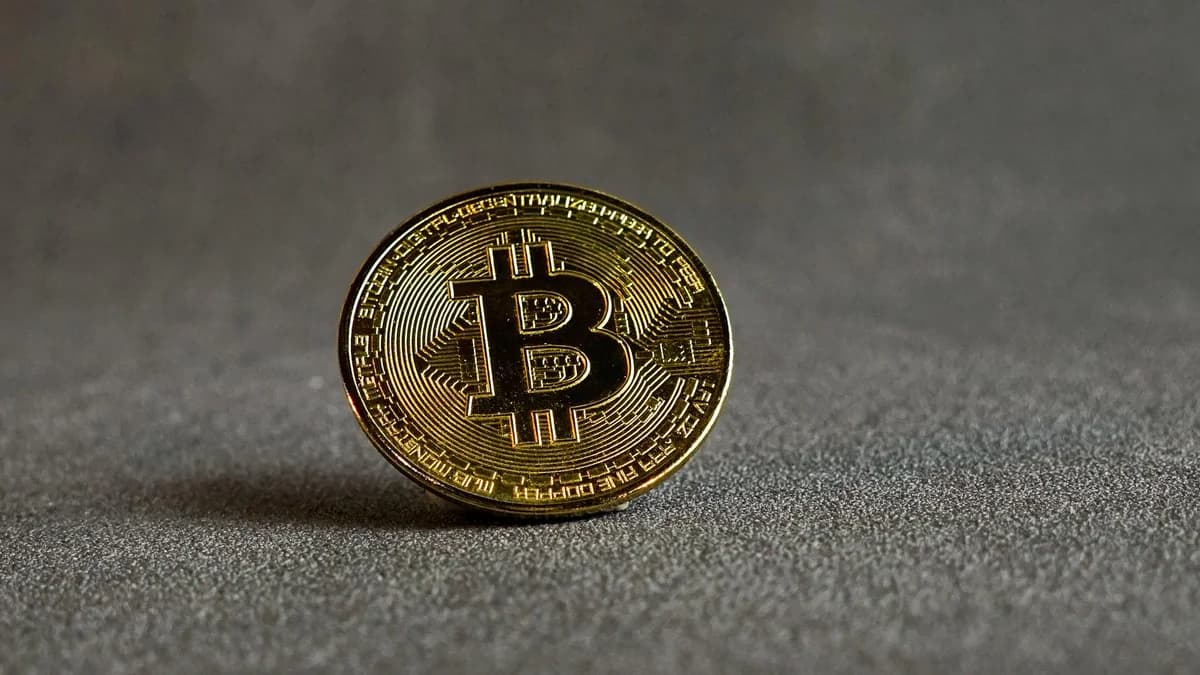 How the FBI Traced Colonial Pipeline's Ransomware Crypto A caution sign for gas pipeline amidst a field of blooming lavender with cloudy skies.