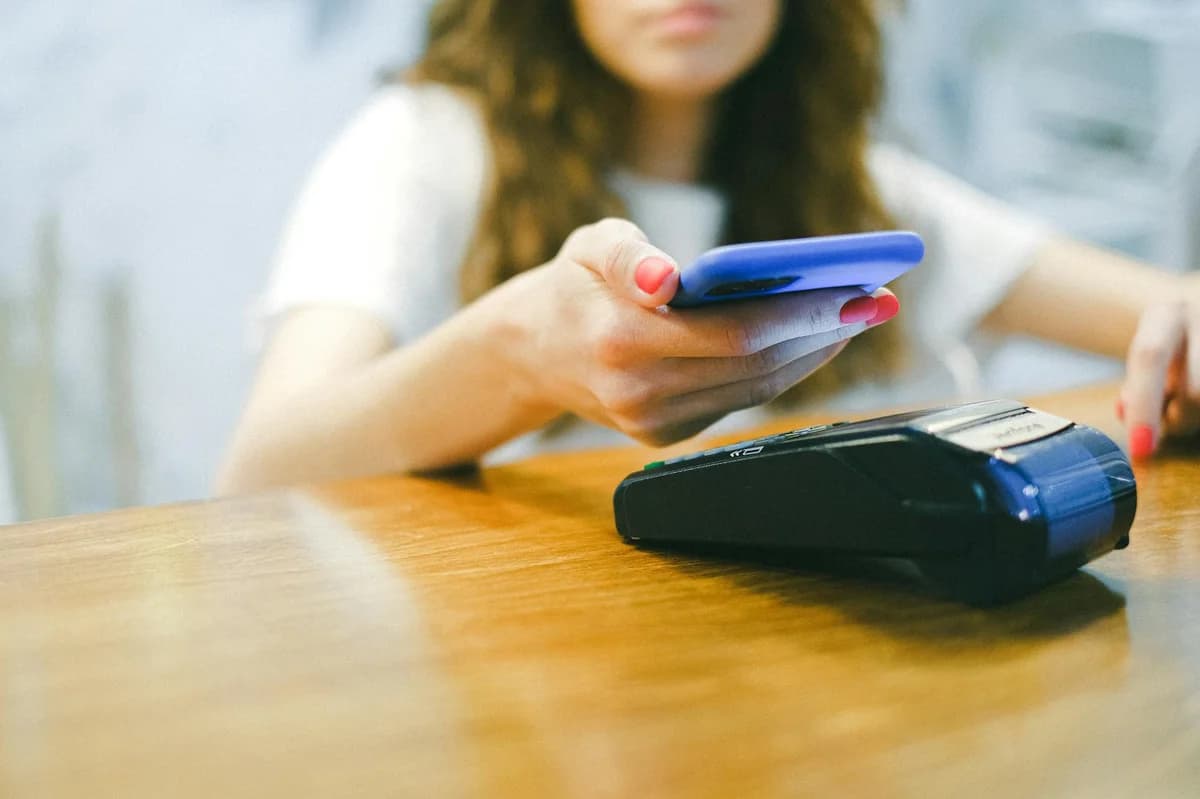 How to Use Token Terminal for Protocol Revenue Side view of crop unrecognizable female in stylish clothes using credit card while buying metro ticket via electronic machine